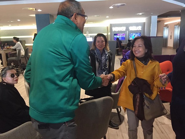 Former Pres. Gloria Arroyo greets ABS-CBN Danny Buenafe upon arrival in Germany Sept. 20.