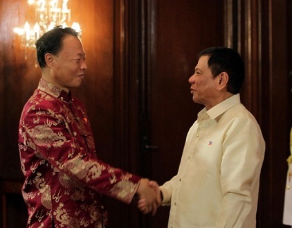 Chinese Ambassador Zhao Jianhua greets President Duterte during the inaugural ceremony in Malacanang,June 30.