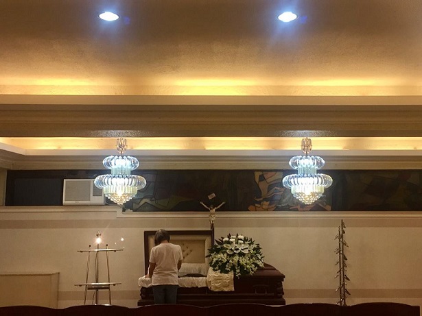 How much more can a mother take? - The mother of Petronio “Jhay-R” Rosales Jr looks over her son’s casket on 1st day of wake. She lost both children to shootings win 3 mos. Photo from the FB page of Anjo Bagaoisan.