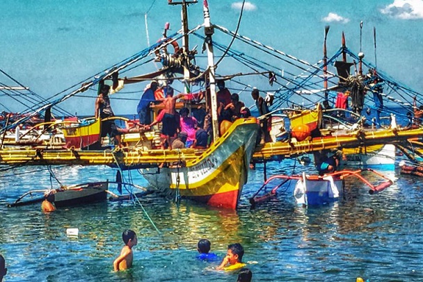 Fishermen back from Scarborough shoal with their catch.